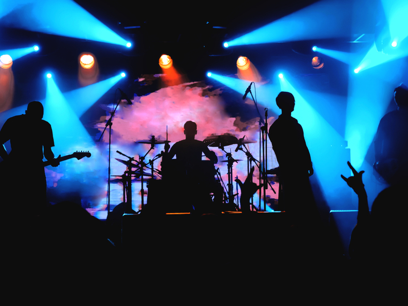 Band playing in shadow